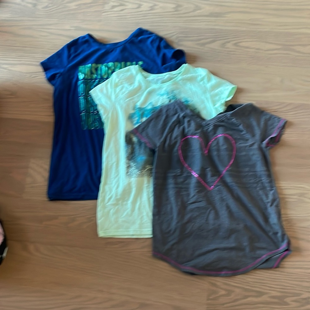 Set of four 8-10 y/o girls t-shirts